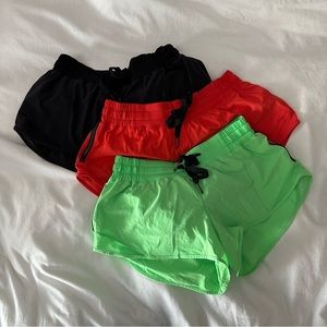Lululemon Hotty hot shorts size 6 EUC. Red, black and neon green.